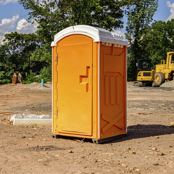 how often are the portable restrooms cleaned and serviced during a rental period in Massac County IL